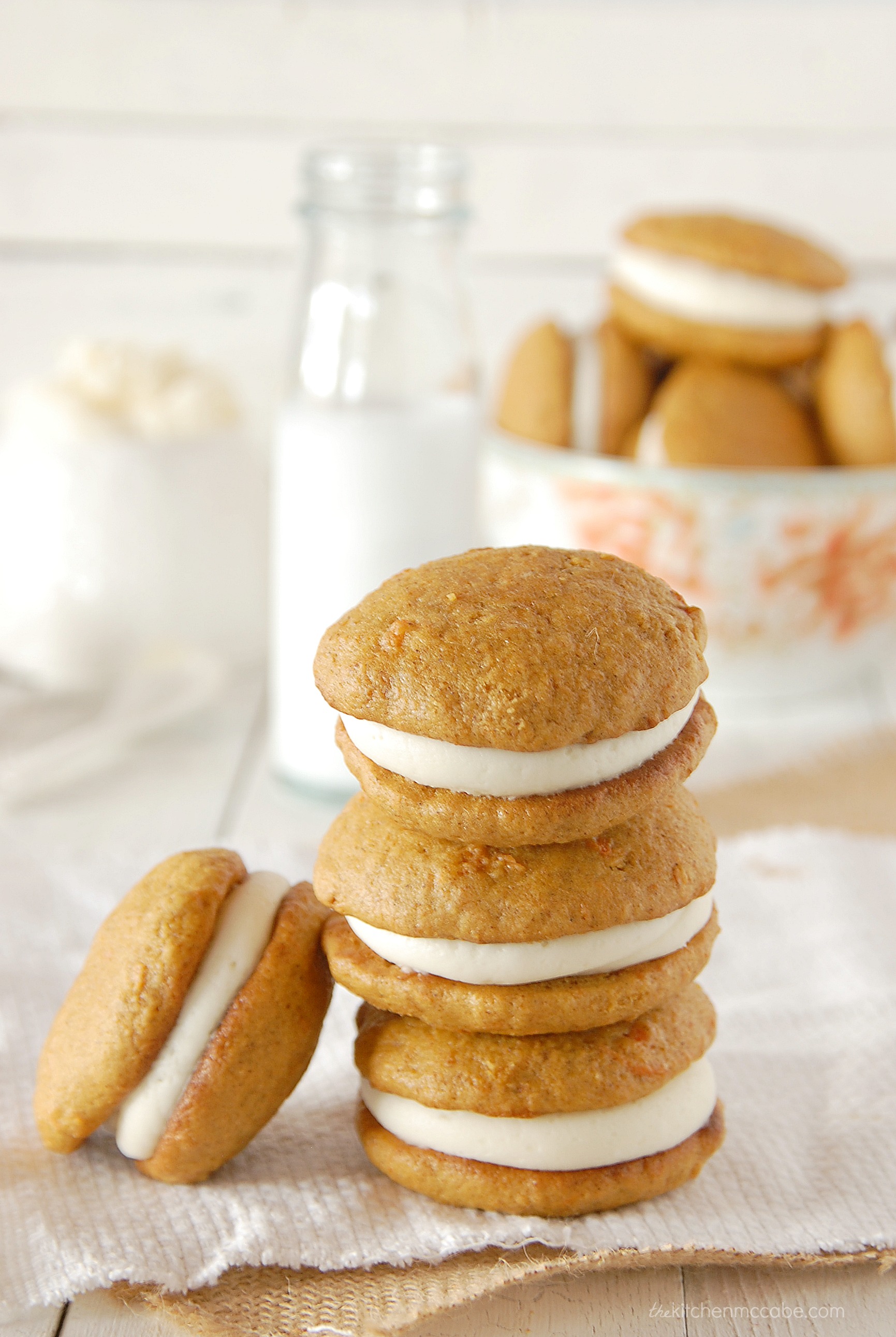 https://www.thekitchenmccabe.com/wp-content/uploads/2014/02/carrot-cake-whoopie-pie-with-almond-cream-cheese-frosting-5.jpg